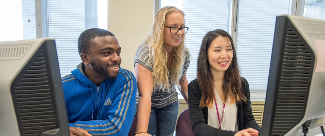 three SIU students working 