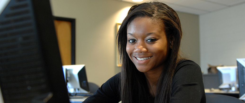 SIU student on computer